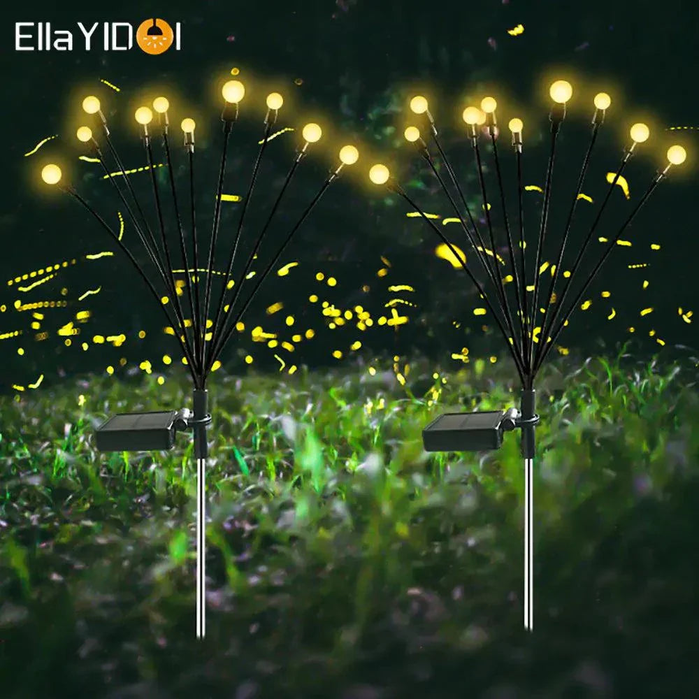 Solar Firefly Lights glowing in a garden at night, featuring flexible wires for realistic firefly effect, solar panel, and waterproof design.