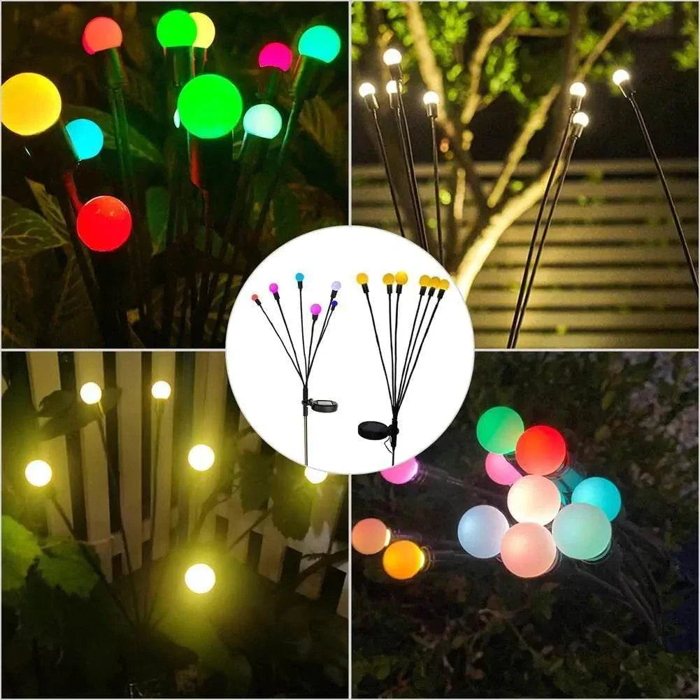 Garden illuminated by colorful solar firefly lights creating a magical ambiance.