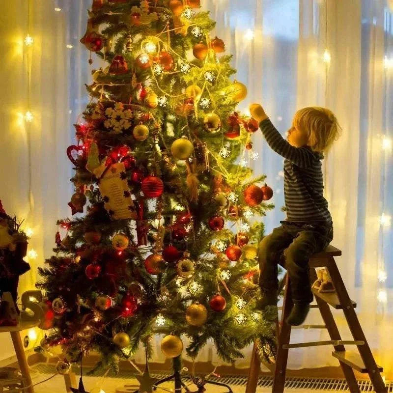 Child decorating Christmas tree with LED Snowflake Lights in cozy room.