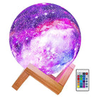 Galaxy Lamp with starry sky projection and adjustable lighting modes on wooden stand.