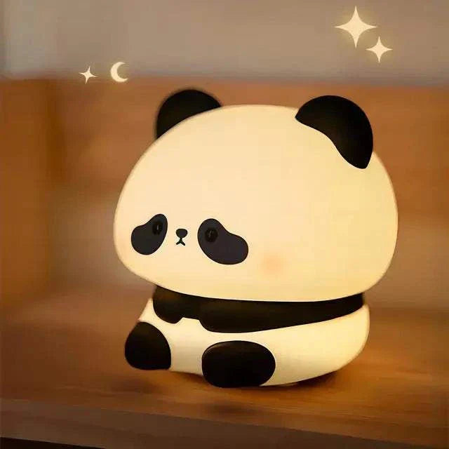 LED Night Lights Cute Sheep Panda Lamp on a wooden surface, providing a warm and cozy glow.