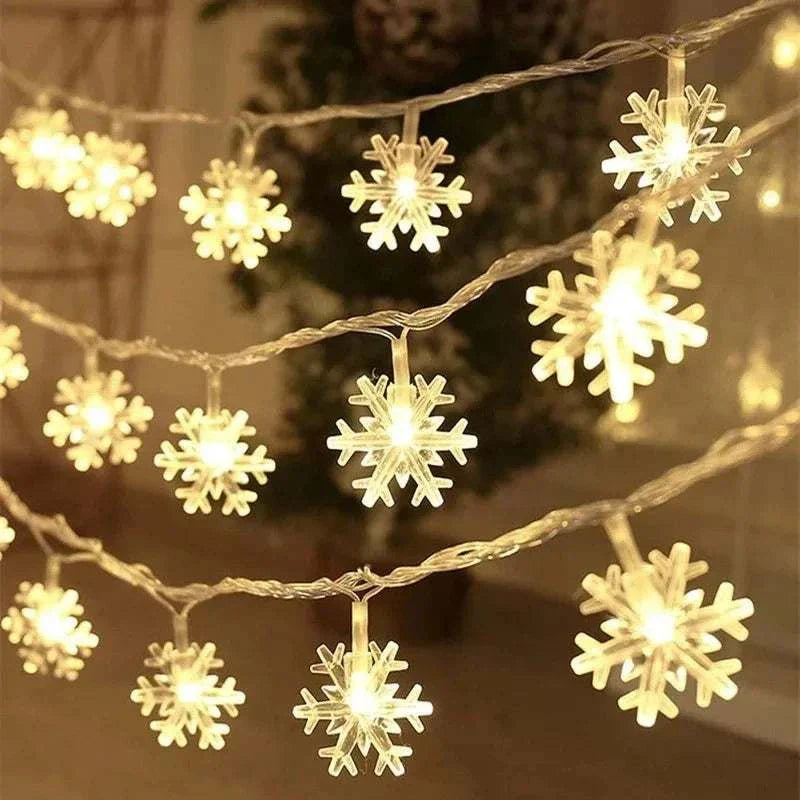 LED snowflake lights illuminating a festive setting.