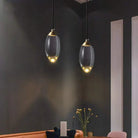 Elegant Raindrop Pendant Lights illuminating a modern living room.