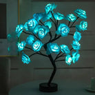 Christmas Card Tree Lights with blue LED flowers on a decorative base.