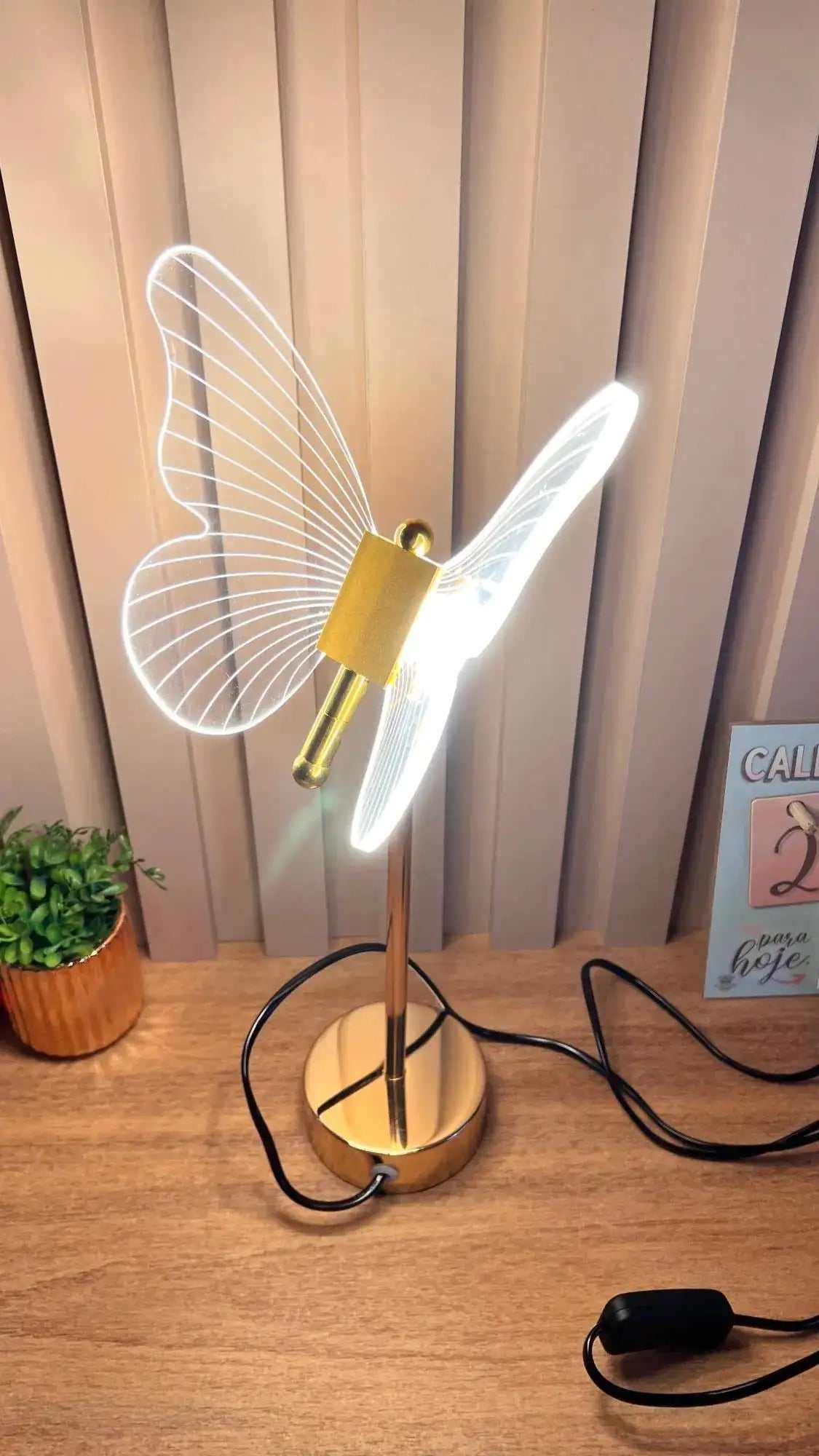 Golden Butterfly Lamp illuminating a room with elegance.