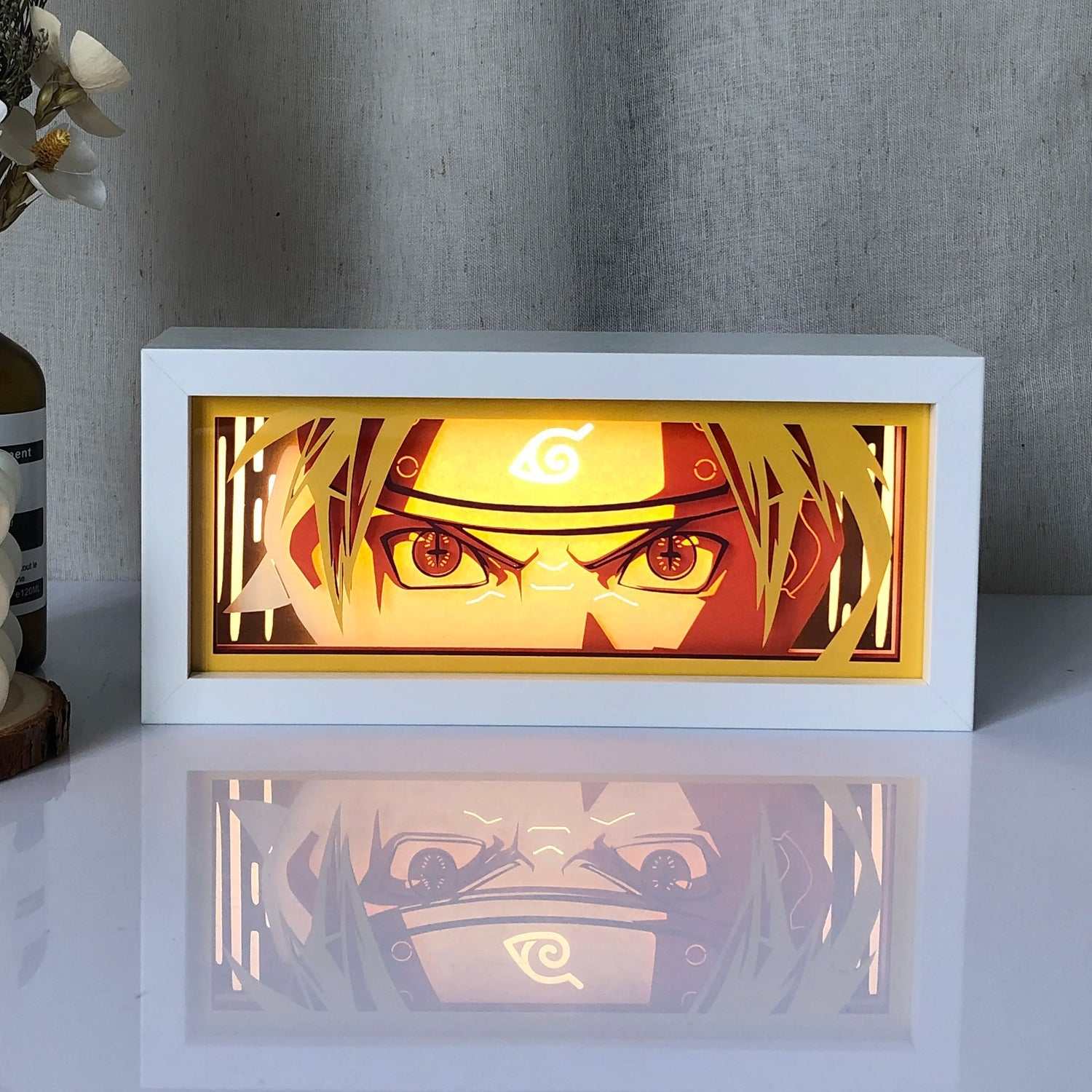 Anime neon light box with glowing character design.