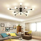 Modern Splatter Chandelier illuminating a stylish living room.