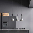 Sleek Funnel Pendant Lights in modern kitchen setting.