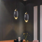 Raindrop Pendant Lights in a modern living space, showcasing elegant copper and glass design.